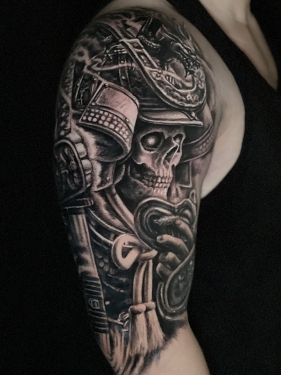 Black and gray realism skeleton samurai warrior half sleeve tattoo with dragon helmet by Zack Ross, large scale tattoo artist Kyle TX near Austin