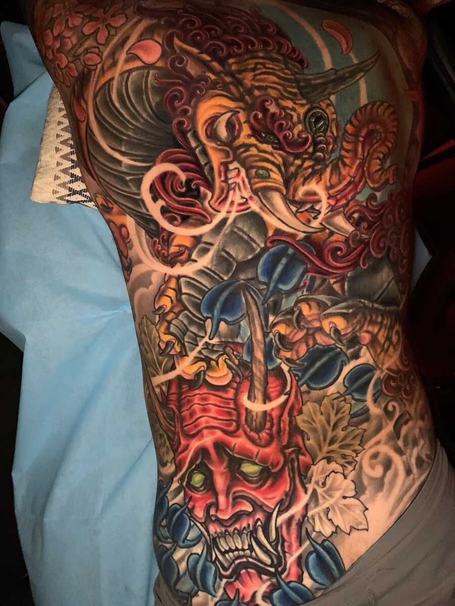 Vibrant color sleeve tattoo detail by Zack Ross, large scale color tattoo artist Kyle TX near Austin and Dallas