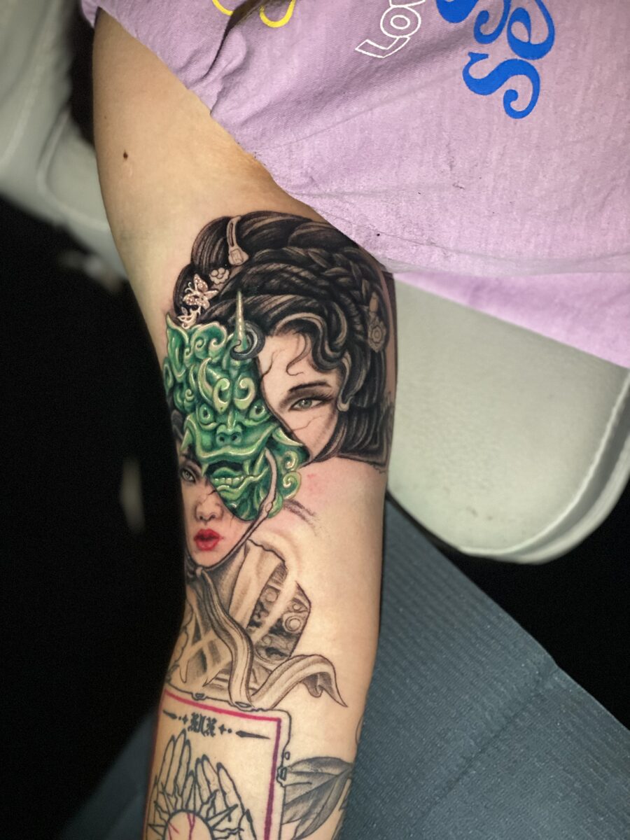 Full color sleeve tattoo by Zack Ross showing bold illustrative style, custom large scale tattoo Kyle TX near Austin Texas