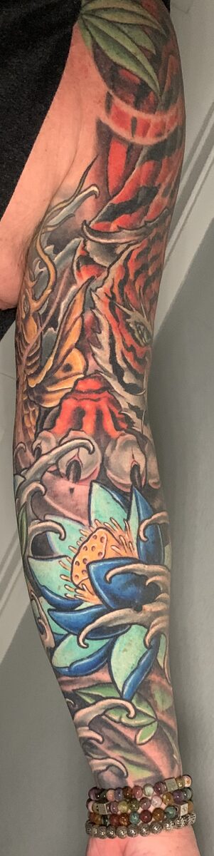 Vibrant color sleeve section by Zack Ross showing full coverage large scale tattoo work, Kyle TX tattoo artist near Austin