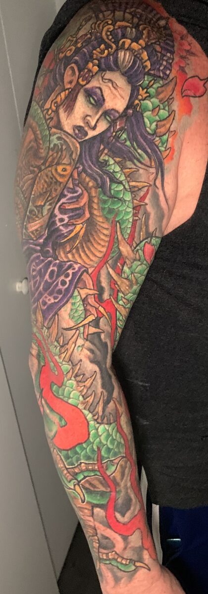 Vibrant color sleeve segment by Zack Ross, full coverage color tattoo design, large scale tattoo artist Kyle TX serving Dallas Texas