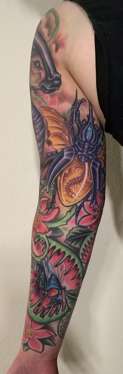 Full color sleeve tattoo by Zack Ross showing large scale Japanese neo-traditional influenced color work, Kyle TX tattoo artist near Austin and Dallas