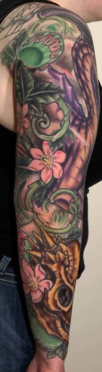 Full color sleeve tattoo panel by Zack Ross featuring bold illustrative color design, custom tattoo artist Kyle TX near Austin Texas